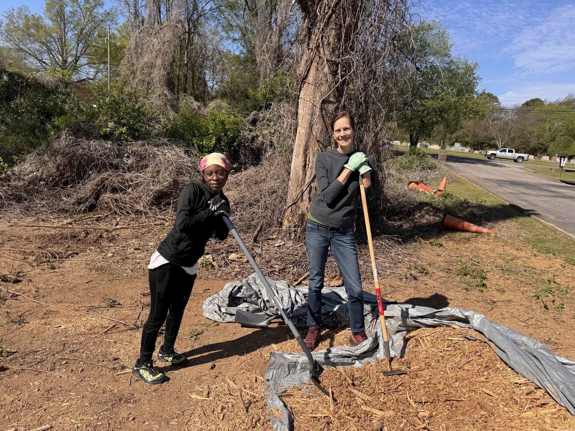 Community members working together in the garden